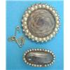 Image 1 : A Victorian gold circular mourning brooch, the plaited hair compartment bordered by 2 rows of spl...