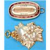 Image 1 : A Georgian gold oval mourning brooch, with white and red enamel borders to the glazed compartment...