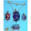 Image 1 : A Victorian gilt metal tortoise brooch, set with an oval carbuncle and rose cut diamonds and 3 gr...