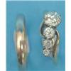 Image 1 : An 18ct gold crossover ring, claw-set with a graduated line of 4 old brilliant cut diamonds, toge...