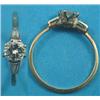 Image 1 : A gold solitaire diamond ring, the shoulders set with tapered baguette diamonds, the brilliant cu...