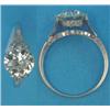 Image 1 : A white metal claw-set solitaire diamond ring, the shoulders and gallery set small diamonds, appr...
