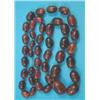 Image 1 : A single row graduated amber bead necklace, 49ins...