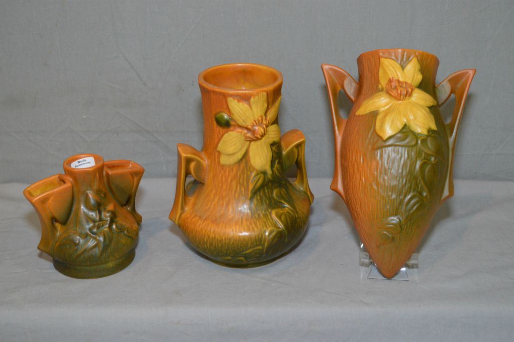 Three pieces of Roseville pottery including double handle 1007 vase