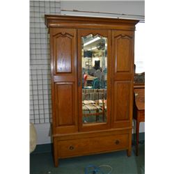 Single door oak wardrobe with raised panel side decorations, bevel glass mirror and drawer base