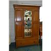 Image 1 : Single door oak wardrobe with raised panel side decorations, bevel glass mirror and drawer base