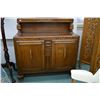 Image 1 : Small oak side board with two doors and fitted flatware drawers and carved decoration