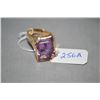 Image 1 : Lady's 14kt yellow gold, amethyst and diamond melee ring set with 8.20ct double cut rectangular amet