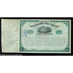 John D. Rockefeller - Standard Oil Trust (New York) A 500 share certificate from 1883 issued to and.