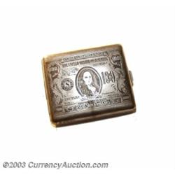 Half-size $100 Cigarette Case. This case has seen some use. The slip and hinge are perfect. One of t