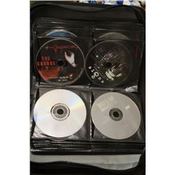 BINDER OF 100 MISC DVD'S