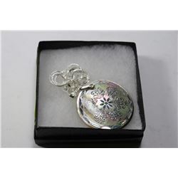 HAND SET SEA SEDIMENT PENDANT