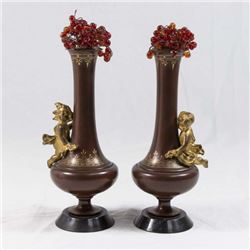 Pair of Patinated Bronze Vases with Cupid Relief