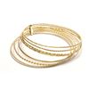 Image 1 : 18K Yellow Gold 7 Bangles