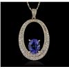 Image 1 : 14KT Yellow Gold 3.83ct Tanzanite and Diamond Pendant With Chain