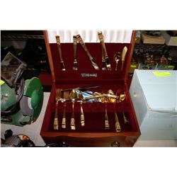 GOLDEN SILVERWARE IN WOODEN BOX
