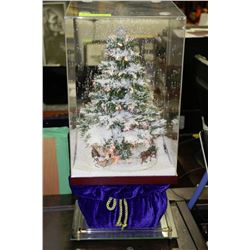 ILLUMINATED AND SNOWING CHRISTMAS MUSICAL DISPLAY