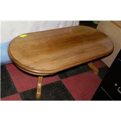OAK OVAL SHAPE COFFEE TABLE 48" LONG X 22" WIDE