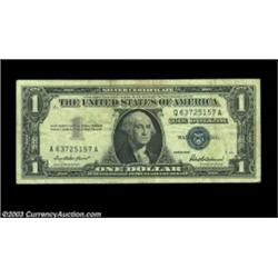 Fr. 1619 $1 1957 Silver Certificate, Fine-Very Fine. Mismatched prefix letters, the left number bein