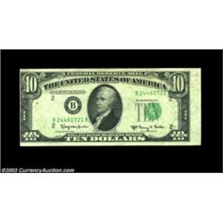 Fr. 2015-B $10 1950E Federal Reserve Note. About Uncirculated. The third printing is slightly skewed