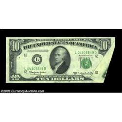 Fr. 2014-L $10 1950D Federal Reserve Note. About Uncirculated.A foldover at the right has resulted i