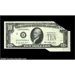 2023-B $10 1977 Federal Reserve Note. Gem Crisp Uncirculated. A very dramatic double foldover error,