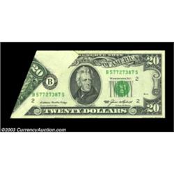 Fr. 2075-B $20 1985 Federal Reserve Note. About Uncirculated.A nice foldover showing the top selvage