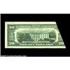 Image 2 : Fr. 2075-B $20 1985 Federal Reserve Note. About Uncirculated.A nice foldover showing the top selvage