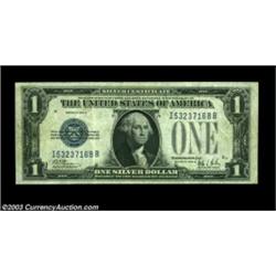 Fr. 1607 $1 1935 Inverted Reverse Silver Certificate, Very Fine. One could make a case for an XF rat