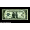 Image 1 : Fr. 1607 $1 1935 Inverted Reverse Silver Certificate, Very Fine. One could make a case for an XF rat