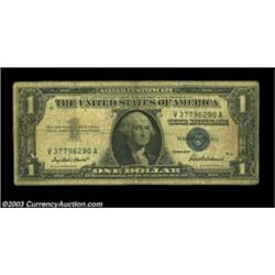 Fr. 1619 $1 1957 Silver Certificate, Very Good-Fine. A surprisingly scarce inverted reverse. Importa