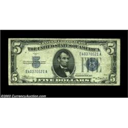 Fr. 1651 $5 1934A Inverted Reverse Silver Certificate, About Fine. Flat out rare as an invert, with.