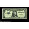 Image 1 : Fr. 1613 $1 1935D Silver Certificate, Very Fine. Inverted third printing, always a dramatic error an