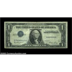 Fr. 1614 $1 1935E Silver Certificate, Fine-Very Fine. Inverted third printing. Important notice: We.