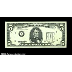 Fr. 1984-E $5 1995 Federal Reserve Note, Gem Crisp Uncirculated. The green Treasury seal and serial.