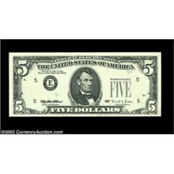 Fr. 1984-E $5 1995 Federal Reserve Note, Gem Crisp Uncirculated. The green ink portion of the third.