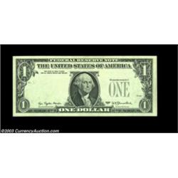 Fr. 1909-B $1 1977 Federal Reserve Note, Gem Crisp Uncirculated. A broad margined Gem with the third
