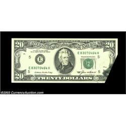 Fr. 2075-E $20 1985 Federal Reserve Note. Extremely Fine. A nice small foldover error, with part of.