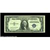 Image 1 : Fr. 1614 $1 1935E Silver Certificate, About Uncirculated. A very sharp back to front offset covering