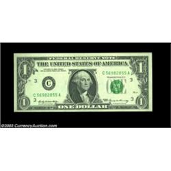 Fr. 1903-C $1 1969 Federal Reserve Note, Choice About Uncirculated. The note's reverse is about 95 p