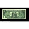 Image 2 : Fr. 1903-C $1 1969 Federal Reserve Note, Choice About Uncirculated. The note's reverse is about 95 p