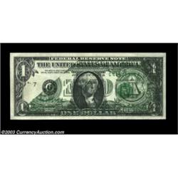Fr. 1907-G $1 1969D Federal Reserve Note. About Uncirculated.A dark back-to-front transfer covers th