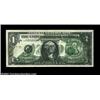 Image 1 : Fr. 1907-G $1 1969D Federal Reserve Note. About Uncirculated.A dark back-to-front transfer covers th