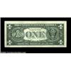 Image 2 : Fr. 1907-G $1 1969D Federal Reserve Note. About Uncirculated.A dark back-to-front transfer covers th