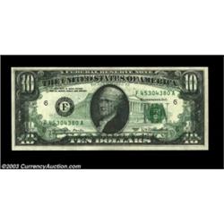 Fr. 2023-F $10 1977 Federal Reserve Note. Gem Crisp Uncirculated.A Bold back-to-face offset covers t