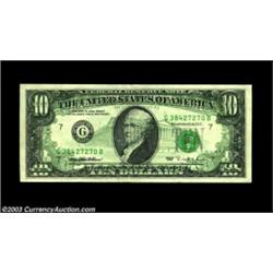 Fr. 2033-G $10 1995 Federal Reserve Note. About Uncirculated. There is a full 100% dark back on face