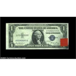 Fr. 1614 $1 1935E Silver Certificate, Choice Crisp Uncirculated. A BEP rejection sticker can be foun