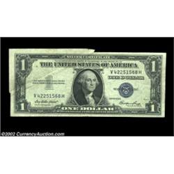 Fr. Fr. 1614 $1 1935E Silver Certificates, Fine and About Uncirculated. Two pieces, the first with a