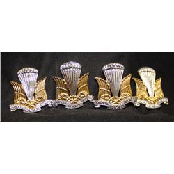 D69. Canadian Parachute Corps Cap Badge Lot