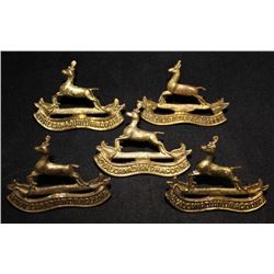 D96. Royal Canadian Dragoons Cap Badge Lot